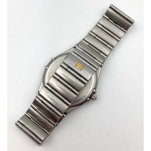 36 - A Vintage Omega Constellation Watch. Stainless steel strap and case - 35mm. White dial with date win... 