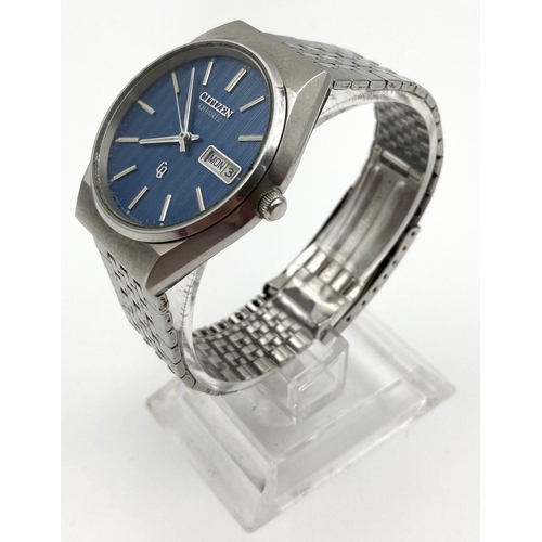 591 - Vintage Citizen Quartz Gents Watch. Stainless steel strap and case - 35mm. Blue dial - in working or... 