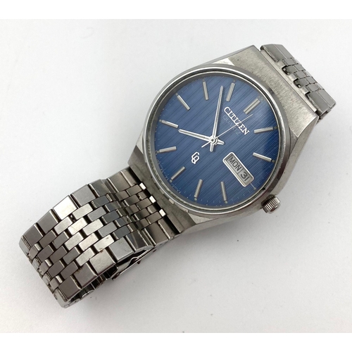 591 - Vintage Citizen Quartz Gents Watch. Stainless steel strap and case - 35mm. Blue dial - in working or... 