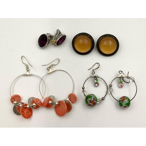 984 - An Eclectic Mix of Over Twenty Pairs of Earrings.