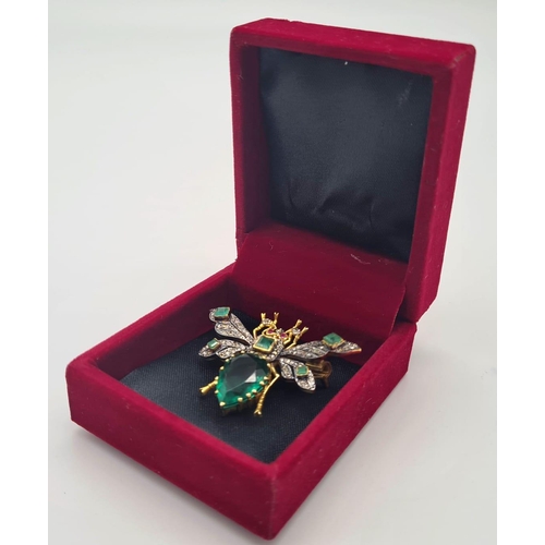 96 - A Butterfly Emerald Beryl & Diamond Gold Plated Brooch. With Ruby Eyes, Diamonds 0.70 Ct, Gemstones ... 