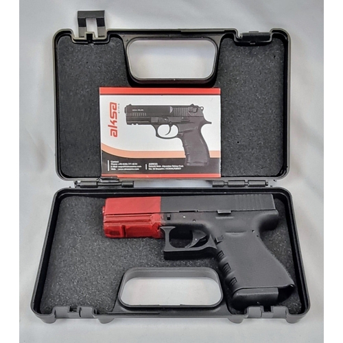 448 - A Blank Firing Glock Pistol by Aksa Arms. 9mm calibre. No - 21-00272 cased. Please note limitations ... 