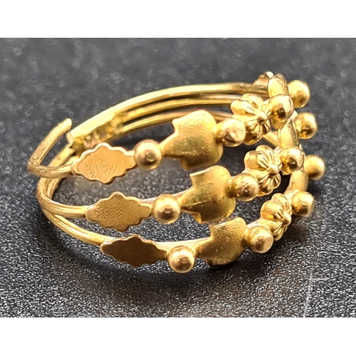 158 - A 21 K yellow gold triple ring. Ring size: M, weight: 3.1 g.