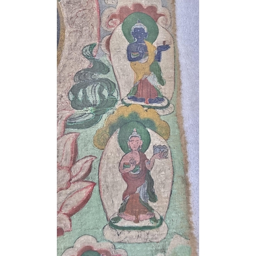 49 - An Early 19th Century Tibetan Thangka Artwork. A painted cloth brocade depicting a Buddhist Deity in... 