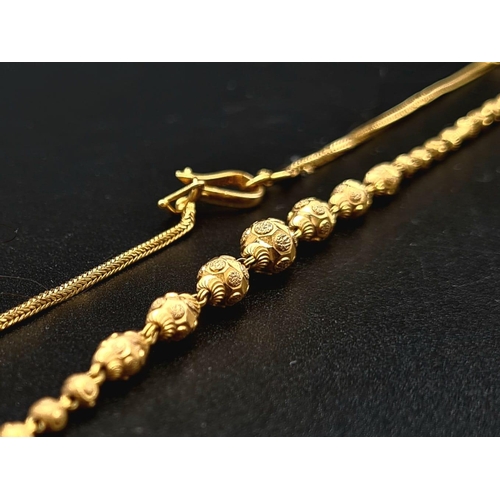 52 - An 18 K yellow gold Indian necklace and earrings set. Necklace length: 42 cm, earrings length: 2.7 c... 