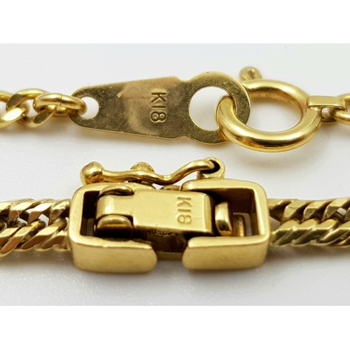 6 - Two 18 K yellow gold items of interest:
A pendant with SNOOPY on a 50 cm chain. AND A chain  bracele... 