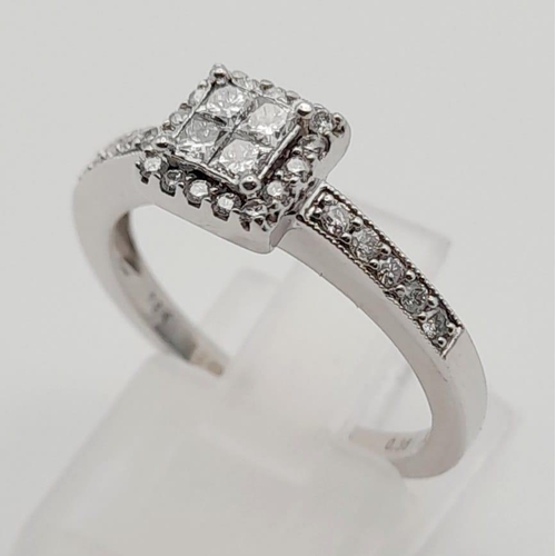 461 - An 18K White Gold Diamond Cluster Ring. 0.38ct. Size N.
3.6g