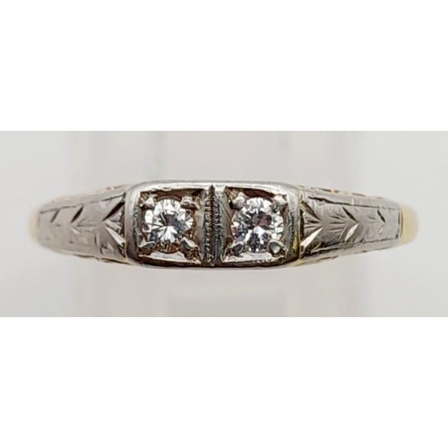 481 - A Vintage 18K Yellow Gold and Platinum Diamond Two-Stone Ring. 0.15ct. Size N. 2.4g