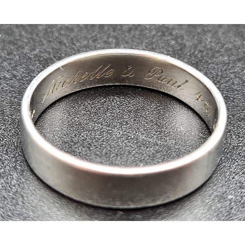 106 - A platinum white gold wedding band. Ring size: T, weight: 7 g.