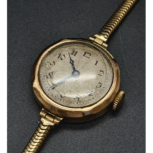 165 - A vintage, ladies, watch, 9 K rose gold in good working order. Dial 25 mm, silver face. Total weight... 