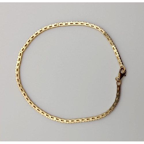 167 - A 14K Yellow Gold Blue Sapphire Tennis Bracelet. 19cm.
4.92g