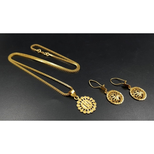 27 - An 18 K yellow gold lot consisting of a pendant with 51 cm chain AND a pair of filigree earrings Len... 