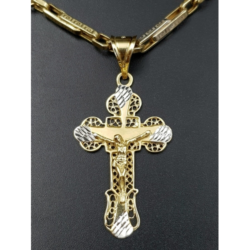 83 - A 14 K gold Russian cross with Jesus pendant with chain. Cross dimensions: 40 x 24 mm, chain length:... 