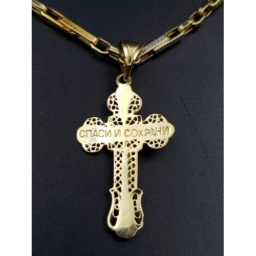 83 - A 14 K gold Russian cross with Jesus pendant with chain. Cross dimensions: 40 x 24 mm, chain length:... 