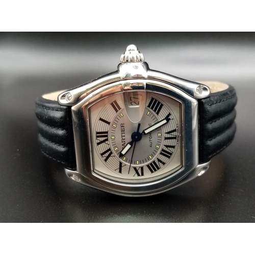 144 - A Cartier Roadster Automatic Gents Watch. Black leather strap with stainless steel case-38mm. Silver... 