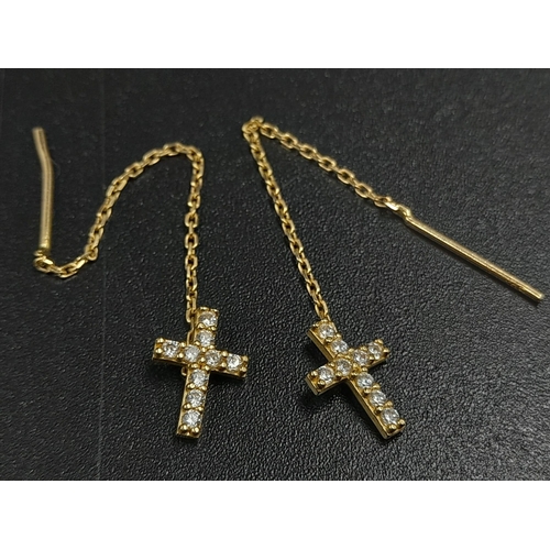 153 - A Disappearing 14K Yellow Gold Necklace and a 14k Yellow Gold Pair of Drop Cross Earrings. 50cm and ... 