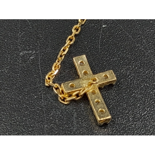 153 - A Disappearing 14K Yellow Gold Necklace and a 14k Yellow Gold Pair of Drop Cross Earrings. 50cm and ... 