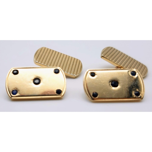 452 - AN ELEGANT PAIR OF YELLOW GOLD AND SAPPHIRE CUFF LINKS.  10.2gms