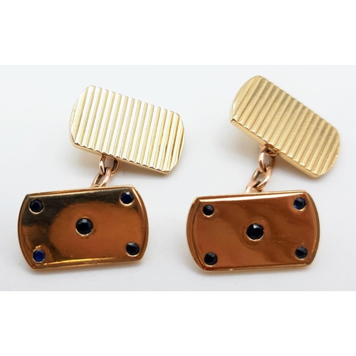 452 - AN ELEGANT PAIR OF YELLOW GOLD AND SAPPHIRE CUFF LINKS.  10.2gms