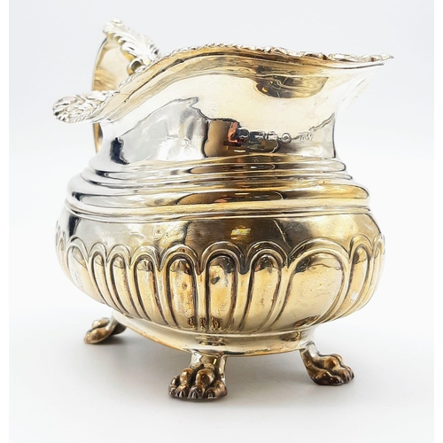 480 - A GEORGIAN HALLMARKED SILVER SAUCE BOAT WITH ORNATE LIP AND CLAW FEET , VERY NICE CONDITION. 222gms ... 