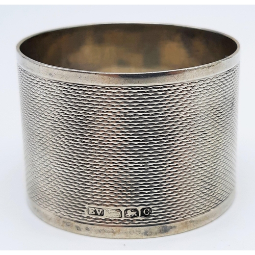 478 - 5 VINTAGE SILVER NAPKIN RINGS. 144.4gms