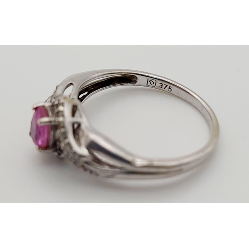 525 - A 9K White Gold Pink Sapphire and Diamond Cluster Ring. 0.10ct. Size K 1/2. 1.7g