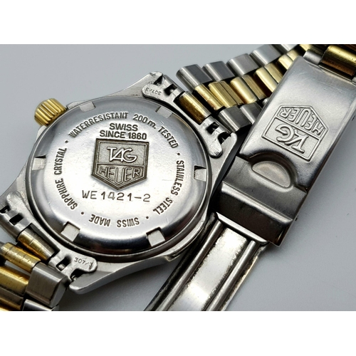 531 - A Tag Heuer 200m Ladies Diver Watch. Two-tone strap and case - 27mm. Gold tone dial with date window... 