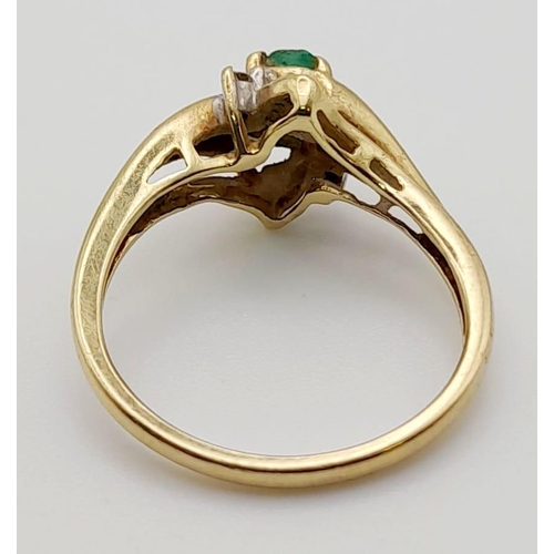 538 - 9K Yellow Gold Diamond and Emerald Cluster Ring. Size N. 2.6g