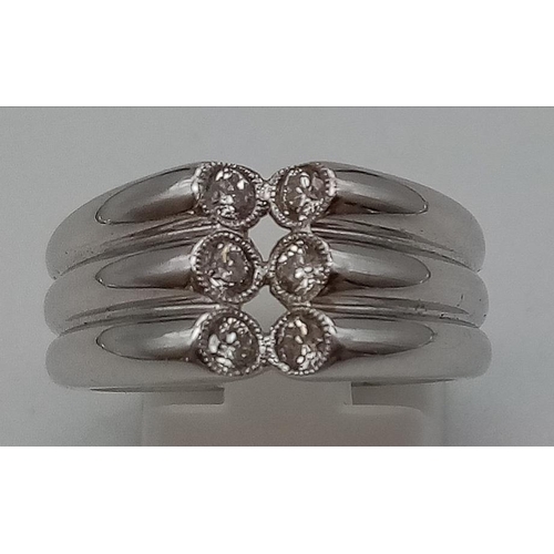 977 - 18K WHITE GOLD DIAMOND 6 STONE RING. 0.39CT. SIZE M 1/2. 11G.