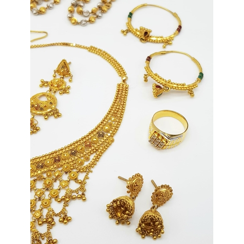 13 - A MIXED LOT OF JEWELLERY TO INCLUDE:
A 21K GOLD BLACK STONE SET NECKLACE AND RING. 42.85gms.
AN 18K ... 