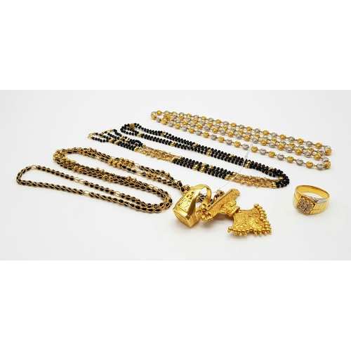 13 - A MIXED LOT OF JEWELLERY TO INCLUDE:
A 21K GOLD BLACK STONE SET NECKLACE AND RING. 42.85gms.
AN 18K ... 