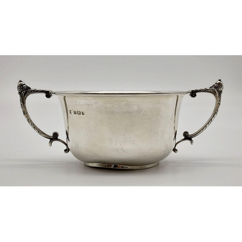 351 - An Antique Silver Double-Handled Cup. Hallmarks for Birmingham 1920. 6cm tall. 10.5cm diameter. 137g... 