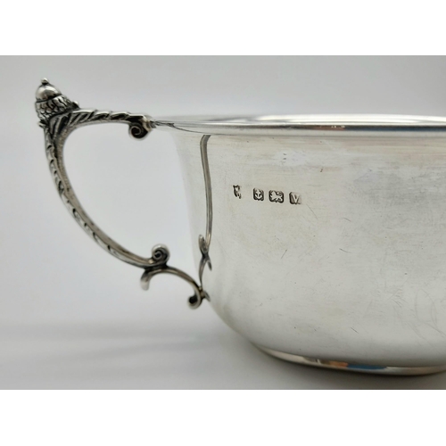 351 - An Antique Silver Double-Handled Cup. Hallmarks for Birmingham 1920. 6cm tall. 10.5cm diameter. 137g... 