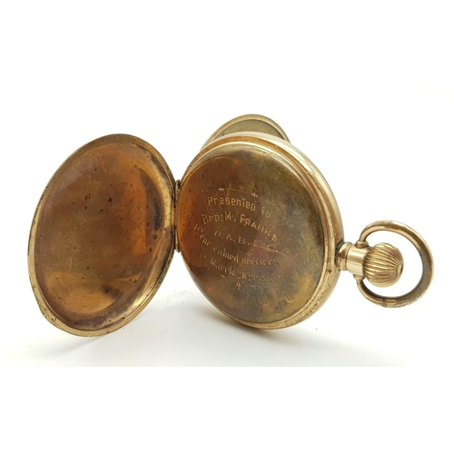 429 - An Antique Full Hunter Gold Plated Pocket Watch. Dennison case. 5cm diameter. Top winder. Not curren... 