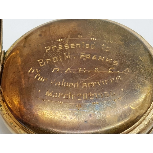 429 - An Antique Full Hunter Gold Plated Pocket Watch. Dennison case. 5cm diameter. Top winder. Not curren... 