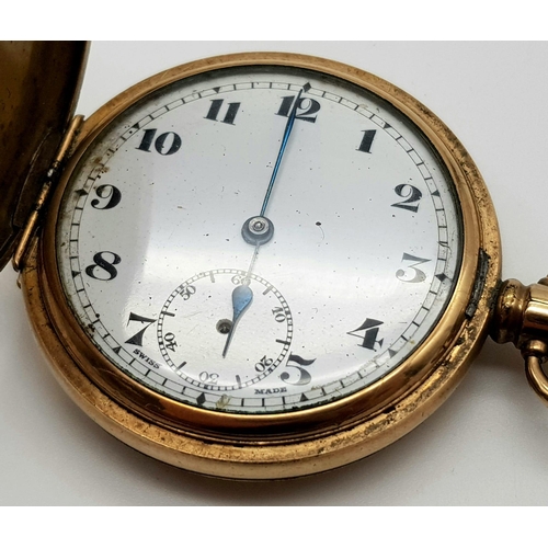 429 - An Antique Full Hunter Gold Plated Pocket Watch. Dennison case. 5cm diameter. Top winder. Not curren... 