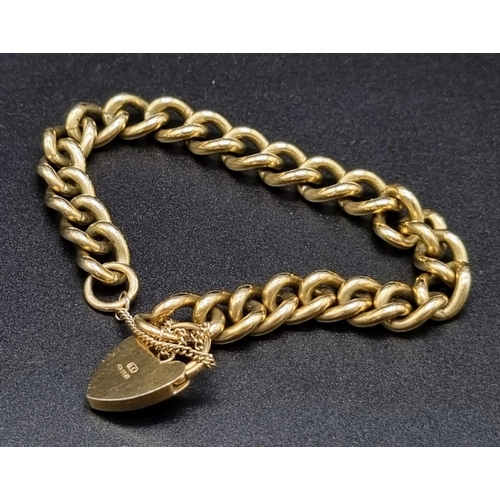 592 - A 9K Yellow Gold Twisted Curb Link Bracelet with Heart Clasp. 20cm. 39.83g