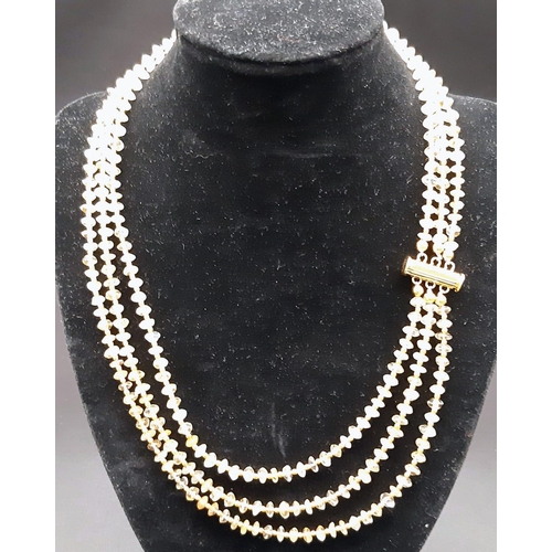 589 - A three strand necklace with Citrine. Necklace length: 45-52 cm, weight: 42 g.