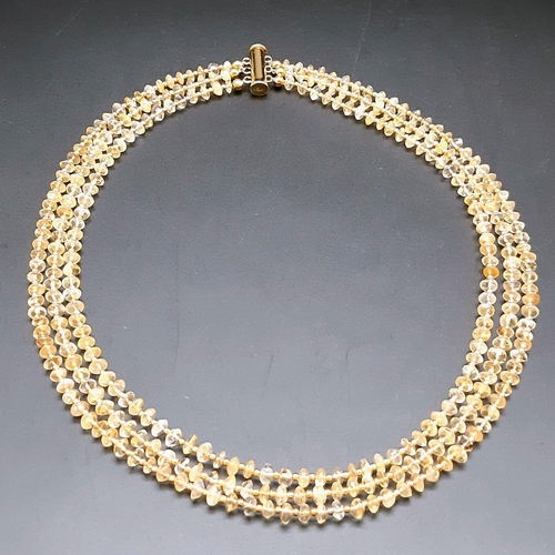 589 - A three strand necklace with Citrine. Necklace length: 45-52 cm, weight: 42 g.