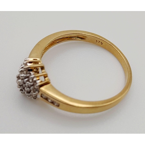 114 - A 9 K yellow ring with a cluster of diamonds. Ring size: N, weight: 2.11 g.