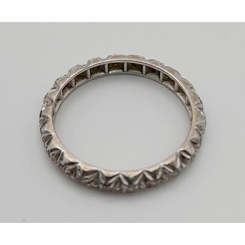 121 - An unusual, 9 K white gold, eternity ring with diamonds. Ring size: L, weight: 2.25 g.