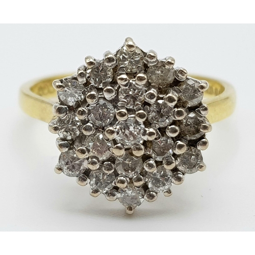 457 - AN 18K GOLD 19 STONE DIAMOND CLUSTER RING WITH 1.5CT DIAMONDS. 5.4gms size R