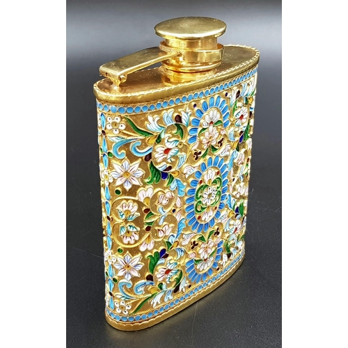 205 - A Delightful Russian Silver and Cloisonné Enamel Hip Flask. Floral decoration and rich gilding throu... 