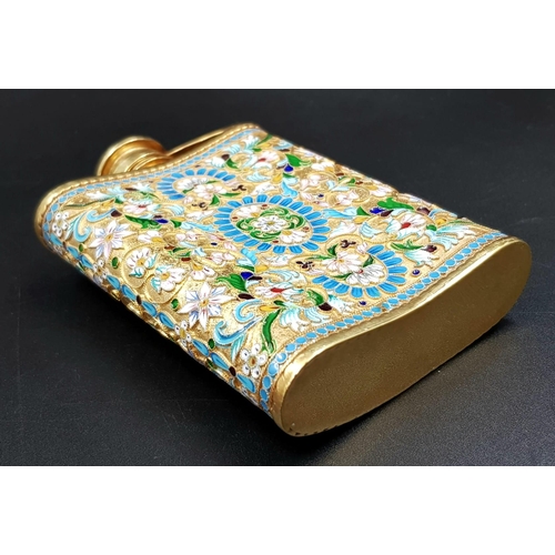 205 - A Delightful Russian Silver and Cloisonné Enamel Hip Flask. Floral decoration and rich gilding throu... 