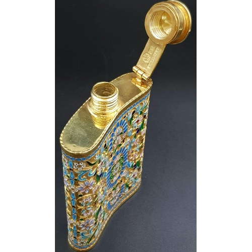 205 - A Delightful Russian Silver and Cloisonné Enamel Hip Flask. Floral decoration and rich gilding throu... 