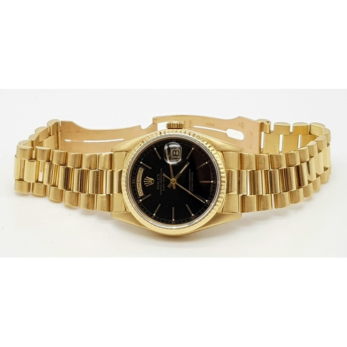 22 - A gents, 18 K yellow gold ROLEX, oyster perpetual, Day Date, 1997 model in very good condition and w... 