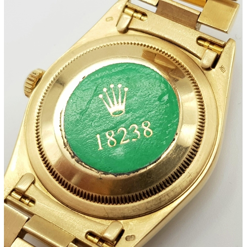 22 - A gents, 18 K yellow gold ROLEX, oyster perpetual, Day Date, 1997 model in very good condition and w... 