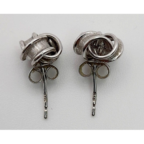 393 - 9K White Gold Knot Stud Earrings 0.6g