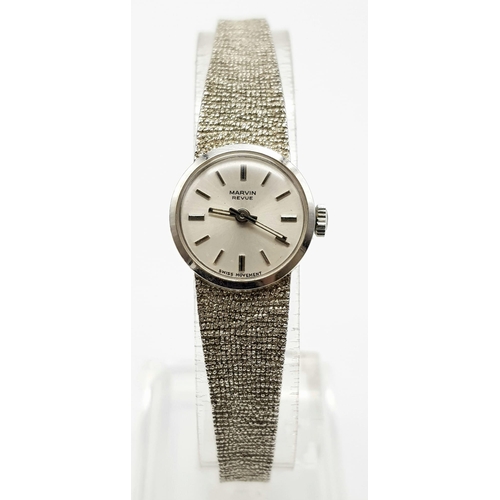 42 - 9K WHITE GOLD MARVIN MANUAL WIND LADIES COCKTAIL WATCH, 18CM LENGHT AND 16MM CASE APPROX
COME IN ORI... 