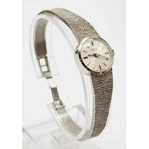 42 - 9K WHITE GOLD MARVIN MANUAL WIND LADIES COCKTAIL WATCH, 18CM LENGHT AND 16MM CASE APPROX
COME IN ORI... 